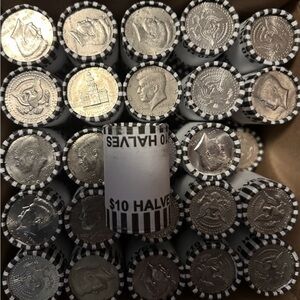 Rolls of Kennedy Half Dollar Coins